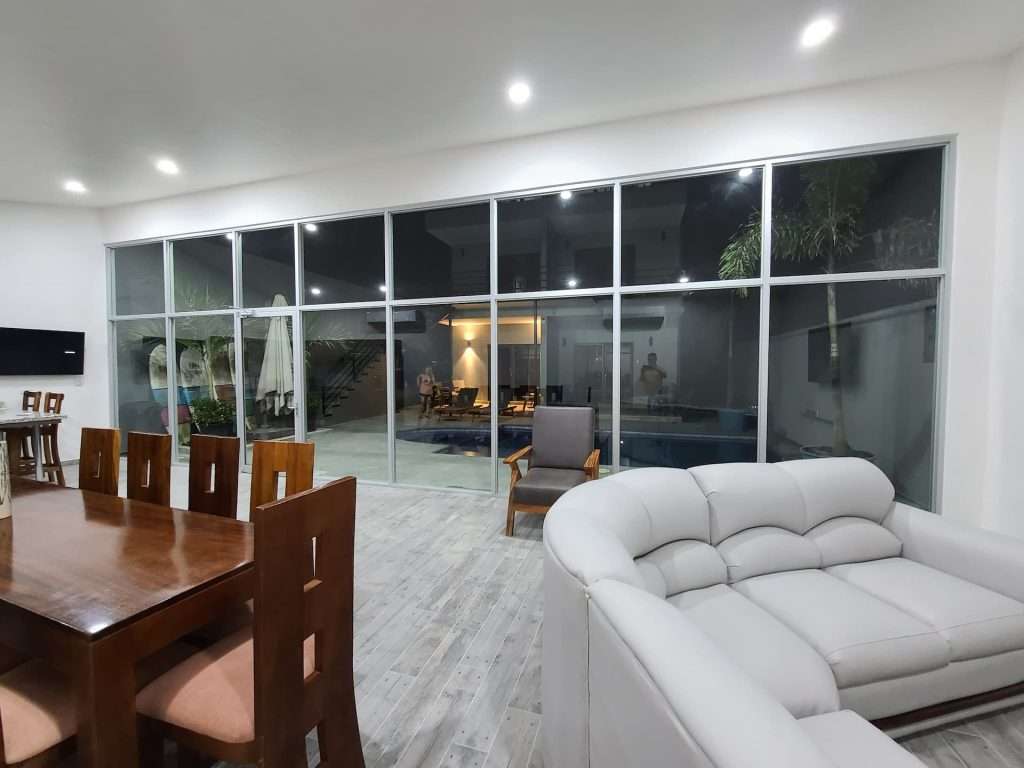 The common area with floor to ceiling windows at Hotel Zocalo